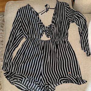 Cute romper with ruffle bottoms and backless